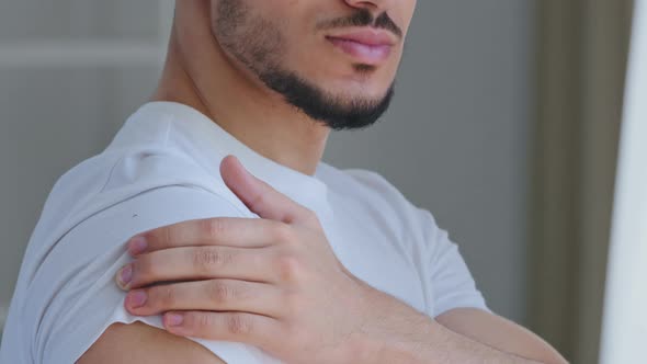 Cropped Shot of Male Shoulder with Plaster After Injection Portrait of Arabic Hispanic Man Sick