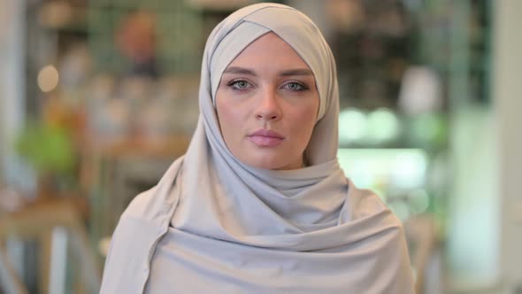 Portrait of Beautiful Young Arab Woman Looking at Camera 