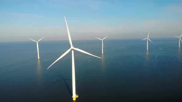 Windmill Park in the Ocean Drone Aerial View of Windmill Turbines Generating Green Energy Electric