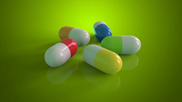 Pills on a green background