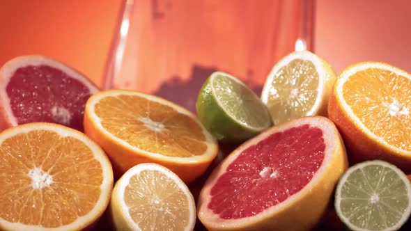 Slow Motion Shot of Lemon Juice Splashing Through Lemon Slices