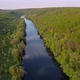 View of the river from above. Flight over water and forest trees from a height - VideoHive Item for Sale