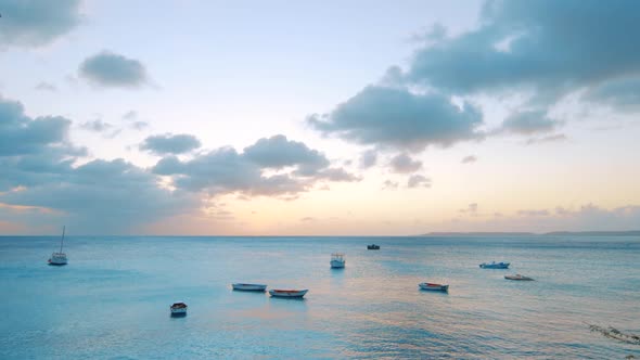 Landscape of multiples fishing boats laying in the harbor during the sunset in Boka Sami, Curacao