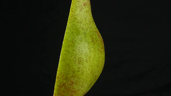 half green pear close up