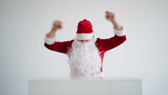 Santa Claus is Dancing Funny on a White Background