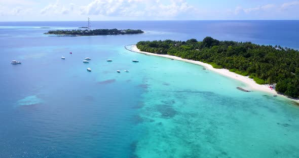 Wide drone abstract shot of a summer white paradise sand beach and blue ocean background in vibrant 