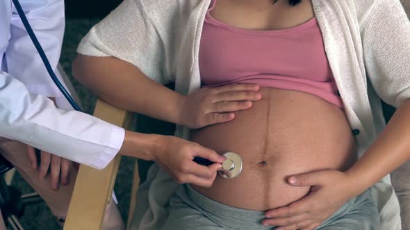 Pregnant Woman and Gynecologist Doctor at Hospital