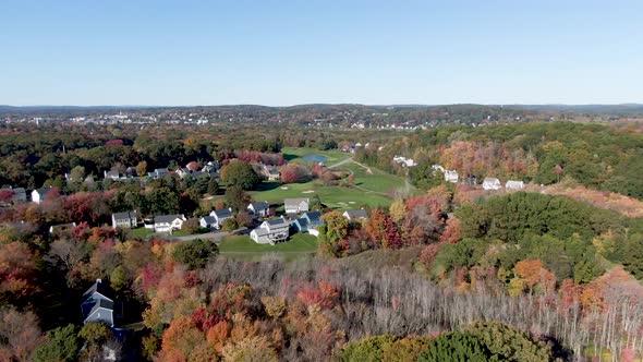 Beautiful town of Haverhill with beautiful autumn colors, aerial drone fly forward view