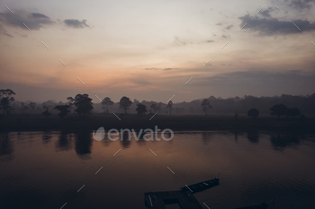 Jungle and Amazon river at sunrise.