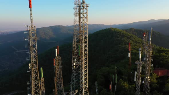 Electrical Towers on the Background of Mountains