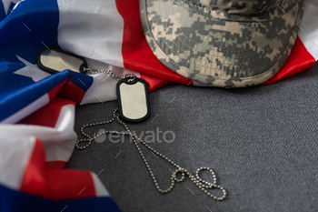 Soldier's token on American flag background.