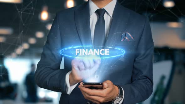 Businessman Smartphone Hologram Word   Finance