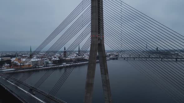 Aerial Revealing Shot of Vansu Bridge with Car Traffic During Winter