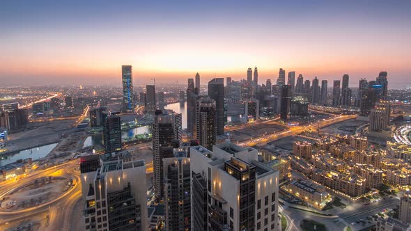 Scenic Aerial View of a Big Modern City Day to Night Timelapse