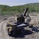 Excavator Loads Stones into a Dump Truck - VideoHive Item for Sale