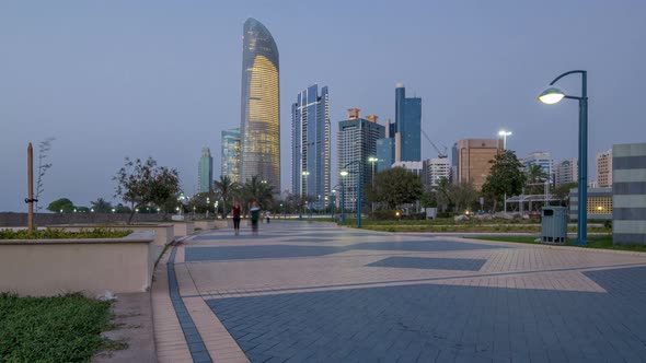 Skyscrapers in Abu Dhabi Skyline Day to Night Timelapse United Arab Emirates