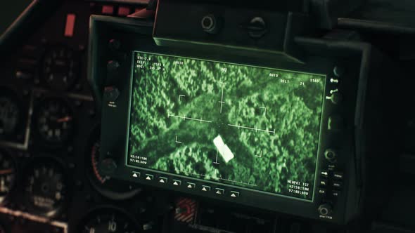 Military weapon display has identified an enemy and attacks the vehicle at night alt