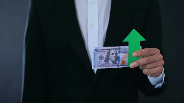 Man Holding Banknotes, Dollar Growing Relative to Japanese Yen, Stock Market