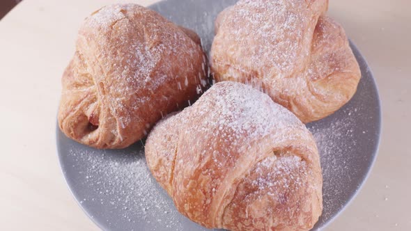 Fresh Croissants on a Plate