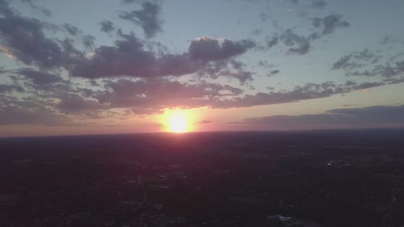 time lapse of small town at sunset