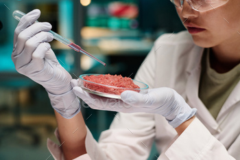 Woman Conducting Experiment on Alternative Lab-Grown Meat