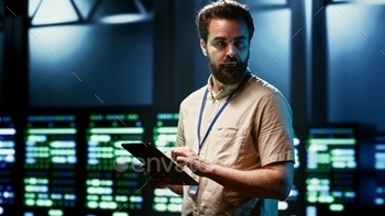 Engineer doing monitoring in server hub