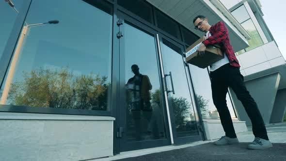 Courier Knocks and Gives a Package To a Lady Client