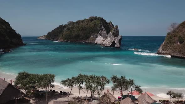 Aerial Top View of Tropical Island Washed By Blue Water of Ocean, Atuh Beach