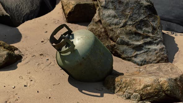 Old Cooking Gas Cylinder on Sand Beach