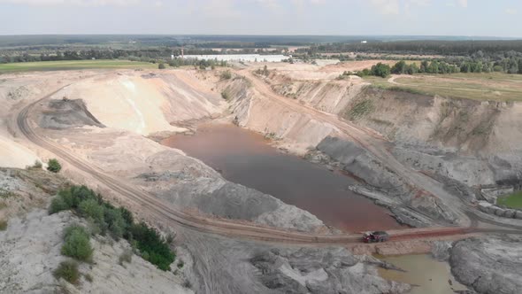 Heavy machinery working at sand quarry