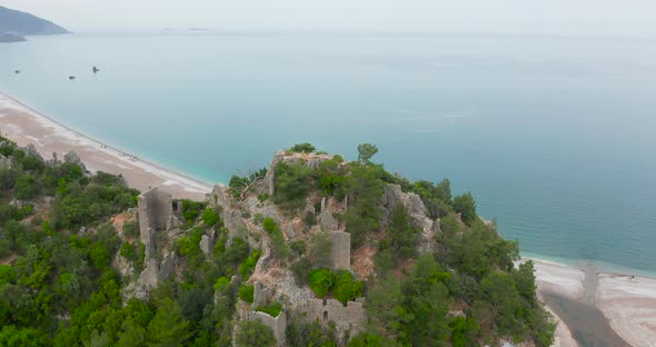 Aerial Drone of Cirali Beach and Olympos Olimpos Mountain in a Beautiful Day Light