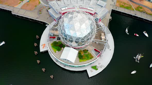 Bird's Eye View Of Science World At Telus World of Science In Vancouver, BC, Canada. - aerial pullba