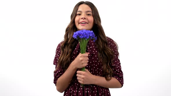 Beauty Portrait of Kid Curly Hair Hold Wildflower Flower Bouquet Smell Centaurea Spring Smell