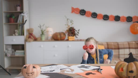 Children Hide Under the Table and Then Jump Out and Say Boo to Camera Boy in Dragon Costume and Kids