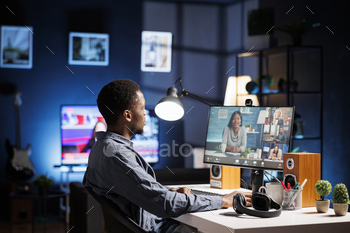 Team member interacts with partners via videoconferencing