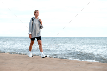 Workout.Gym sports workout outdoor urban.Fit,gym motivation,wellness.Woman exercising outdoors sea.H