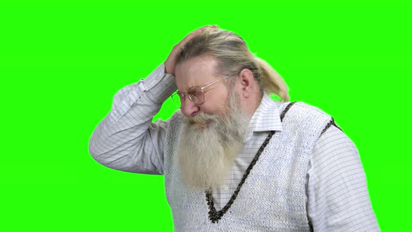 Elderly Bearded Man Having Severe Headache