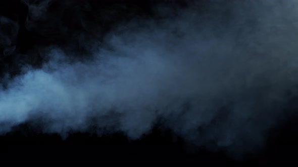Smoke texture over blank black background. Mystical steam at night.