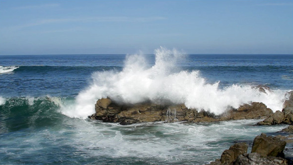 Waves Splash On Rocky Shore