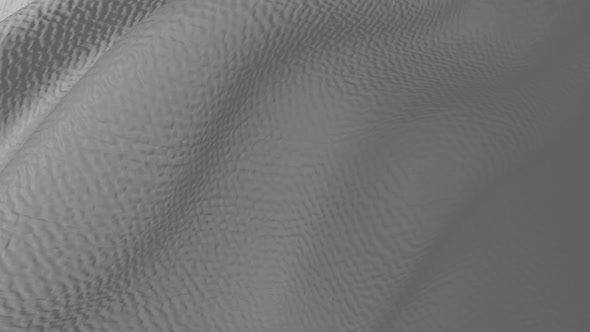 Smooth movements of waves of gray textured cloth.