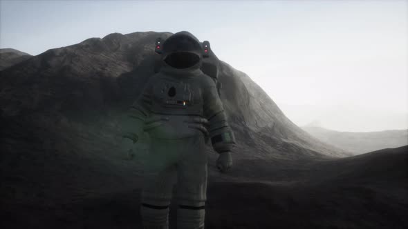 Astronaut on Another Planet with Dust and Fog alt