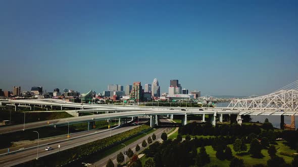 4k Aerial View of Drone Flying Over Bridges Outside Louisville with Skyline in The Distance