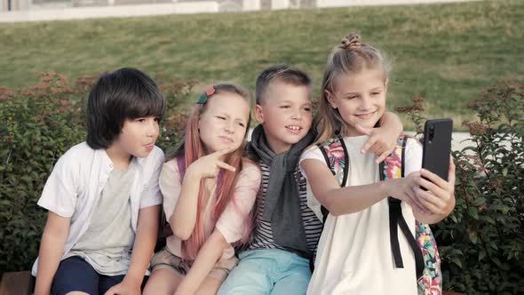 Little Kids Making Faces While. Taking Selfie