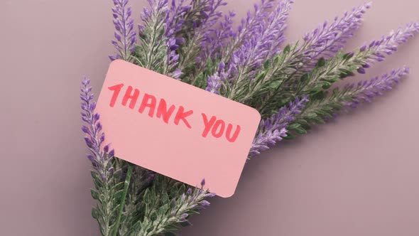 Thank you Message and Lavender Flower on Purple Background