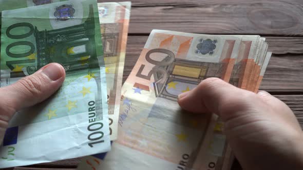 Man Counting Euro Banknotes 5