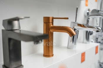 Rows of new faucets in plumbing shop