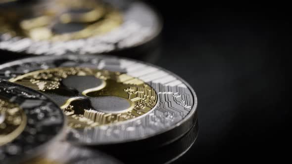 Rotating shot of Bitcoins (digital cryptocurrency) - BITCOIN RIPPLE 