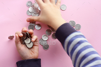 a lot of coins in the hands, russian ruble, counting money, economy, allocation of money, wealth