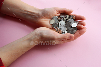 a lot of coins in the hands, russian ruble, counting money, economy, allocation of money, wealth