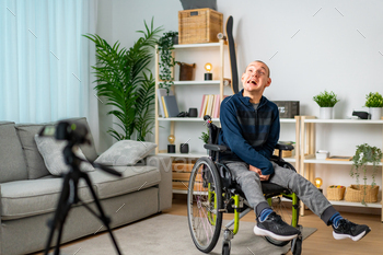 Disabled man recording a video tutorial at home